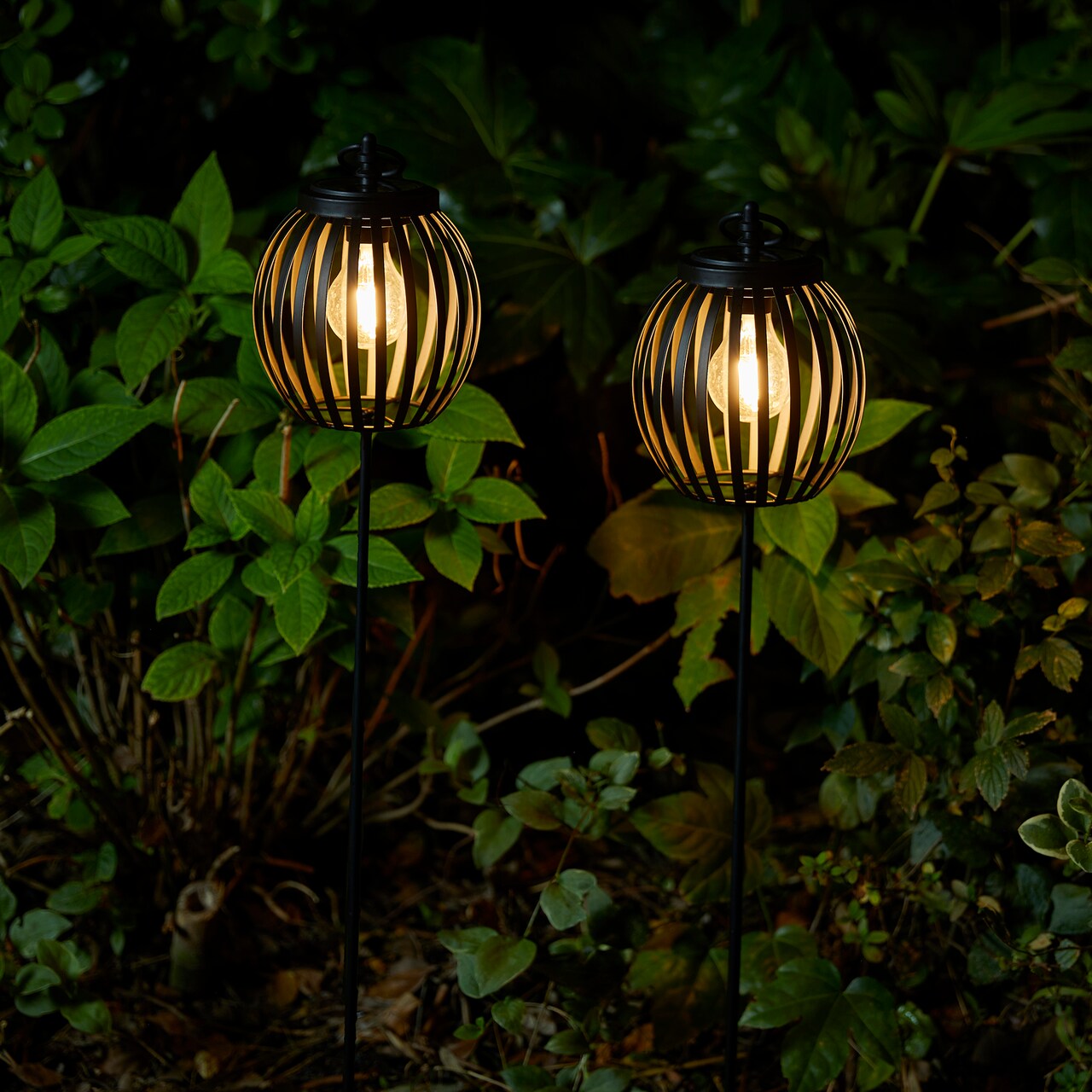 Set of 2 32.25"H Black Metal Stripes Solar Powered Outdoor Lantern with Edison Bulb and Stake